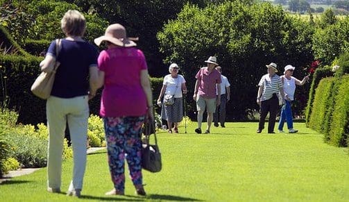 Home owners in garden